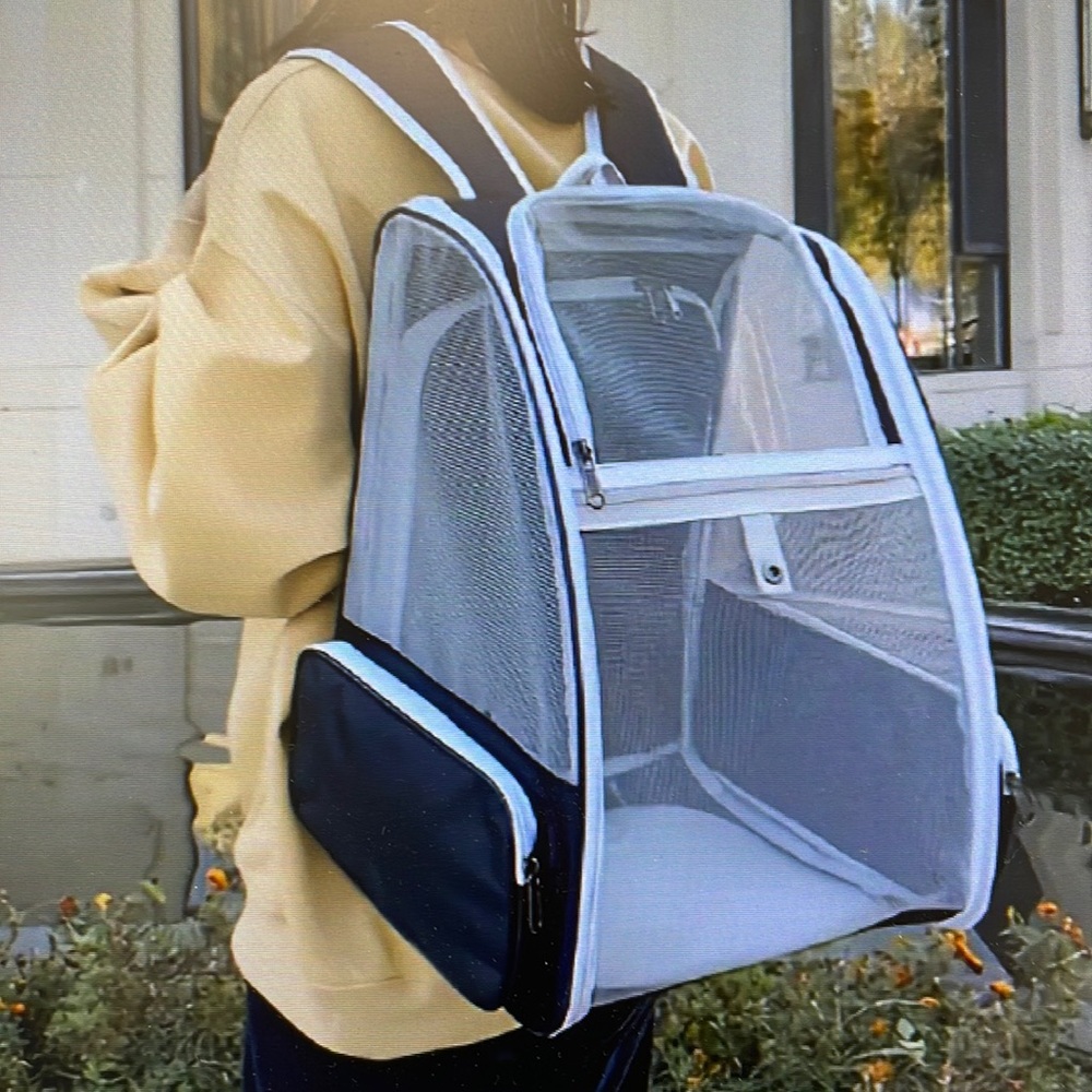 Pet carrier backpack for dogs and cats.
